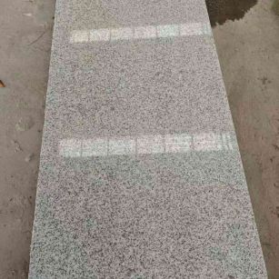 广西芝麻白光面毛板