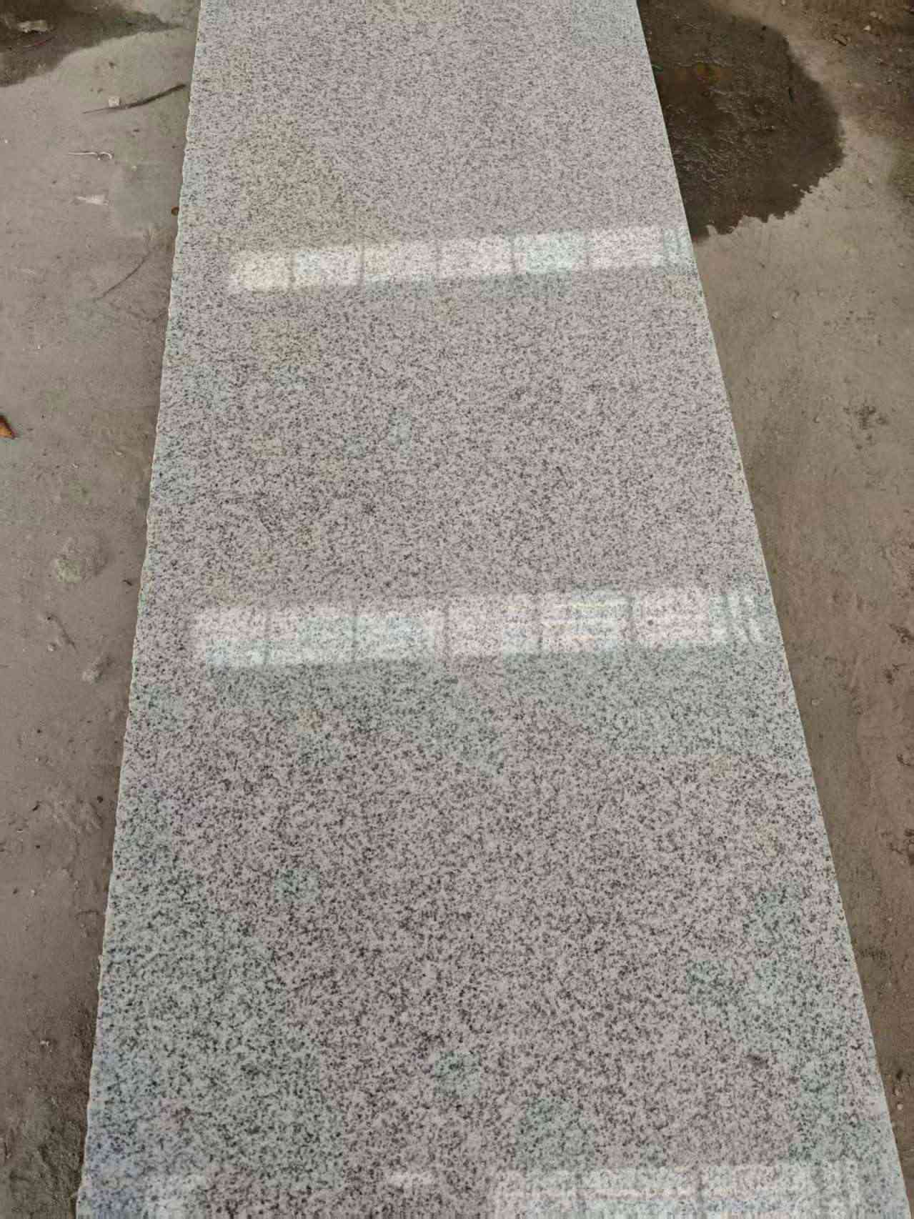 广西芝麻白光面毛板